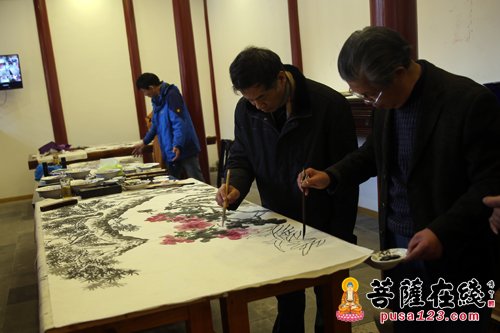 挥毫泼墨 上海南山古寺举行迎新书画笔会活动